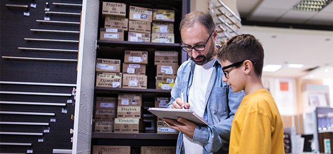 Father and son checking inventory