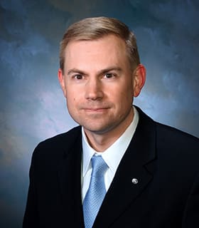 Headshot of Christopher Kelly